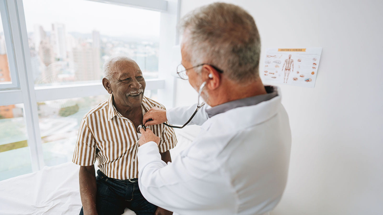 doctor listening to patients heart