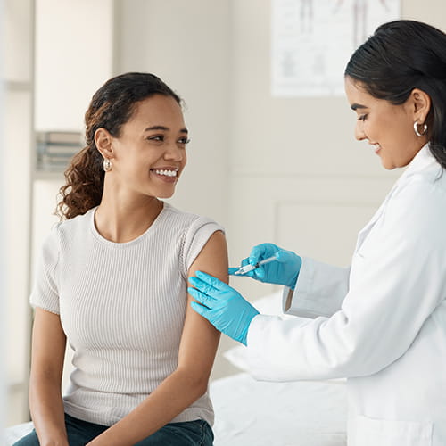 doctor giving vaccines