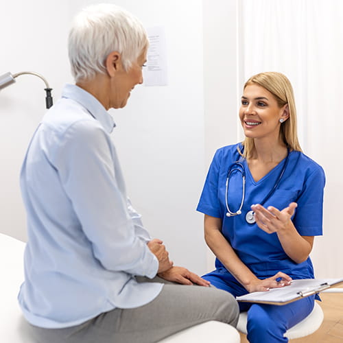 doctor talking to patient