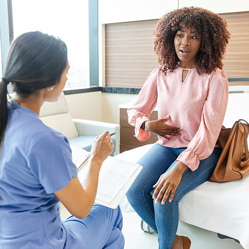 patient talking to doctor
