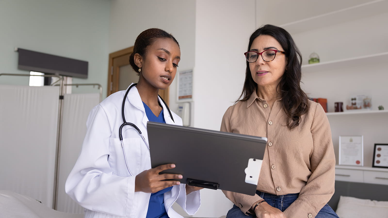doctor talking to patient