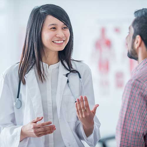 Adult goes to medical appointment at doctor's office.