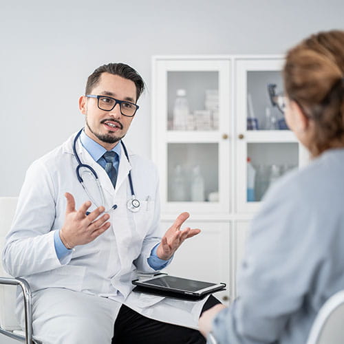 doctor talking to patient