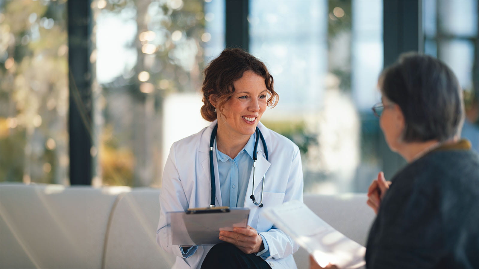 doctor talking with a patient