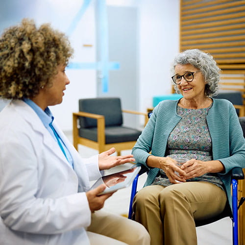 doctor with older female patient
