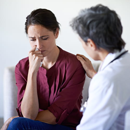 doctor comforting patient