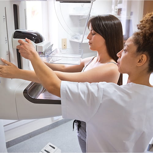 woman getting a mammogram