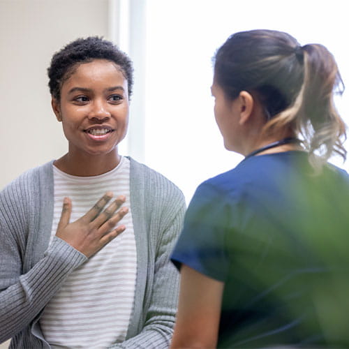 woman talking to doctor