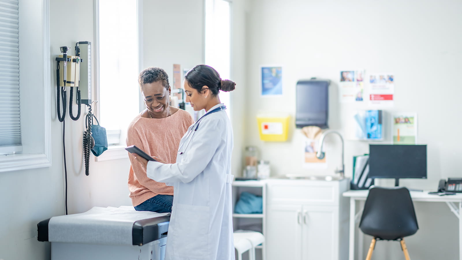 doctor talking to patient
