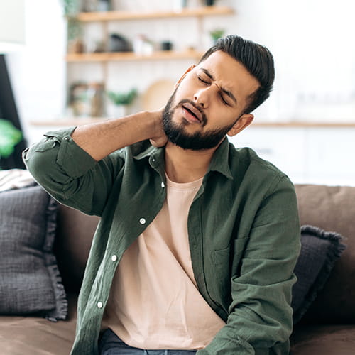 man with neck pain