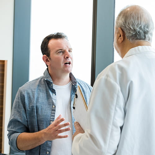 patient talking to doctor